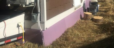 Foam board insulation for skirting a tiny house